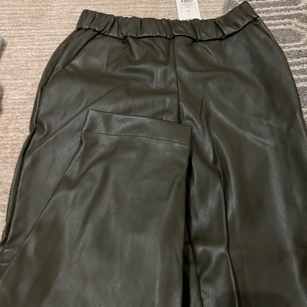 Green faux leather pants